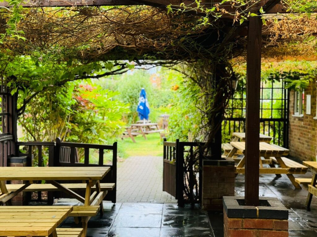 seating on the patio in the garden at The Woolpack Buckingham