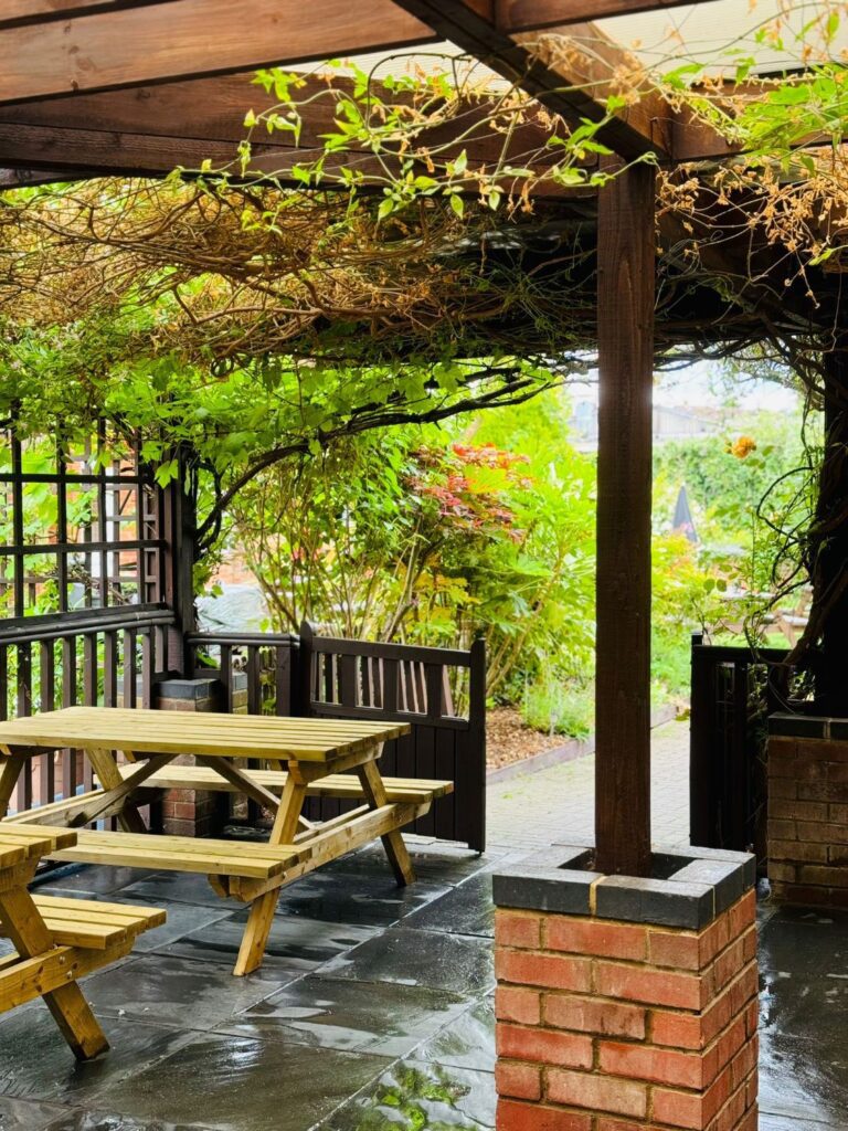 seating on the patio in the garden at The Woolpack Buckingham